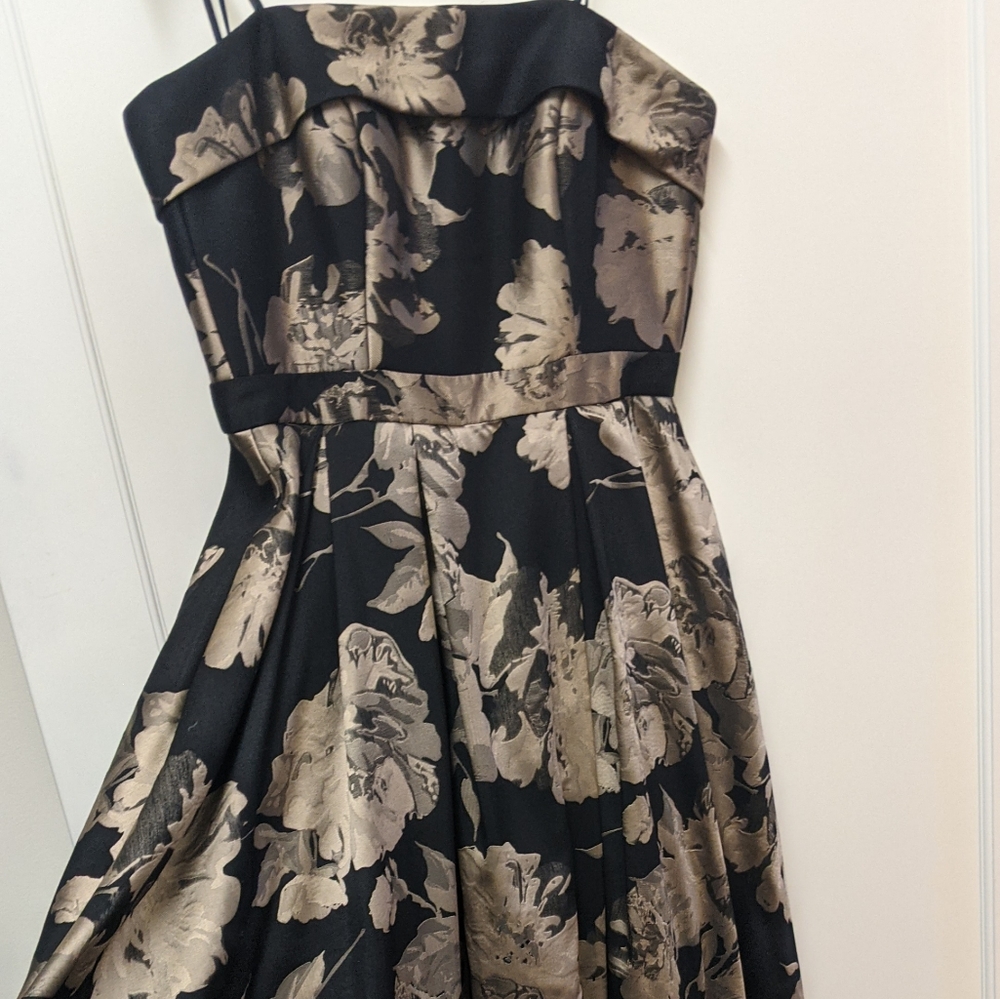 Xscape black and gold gown